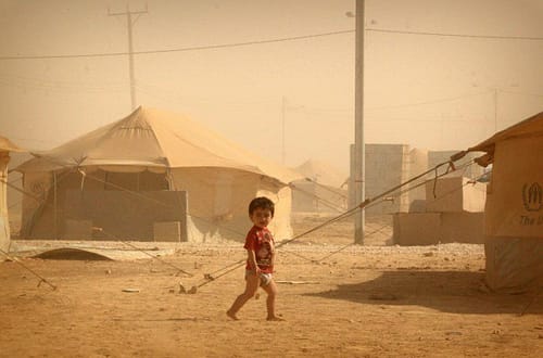 Refugees - Child in Zataari camp, Jordan © Tom Rübenach
